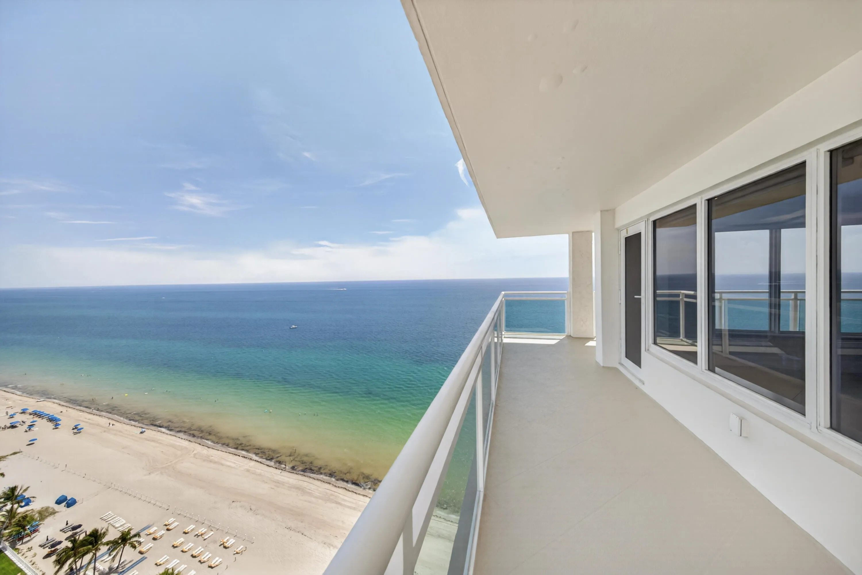 Enjoy dramatic views of the beach, turquoise shoreline and open Atlantic from the expansive balcony.