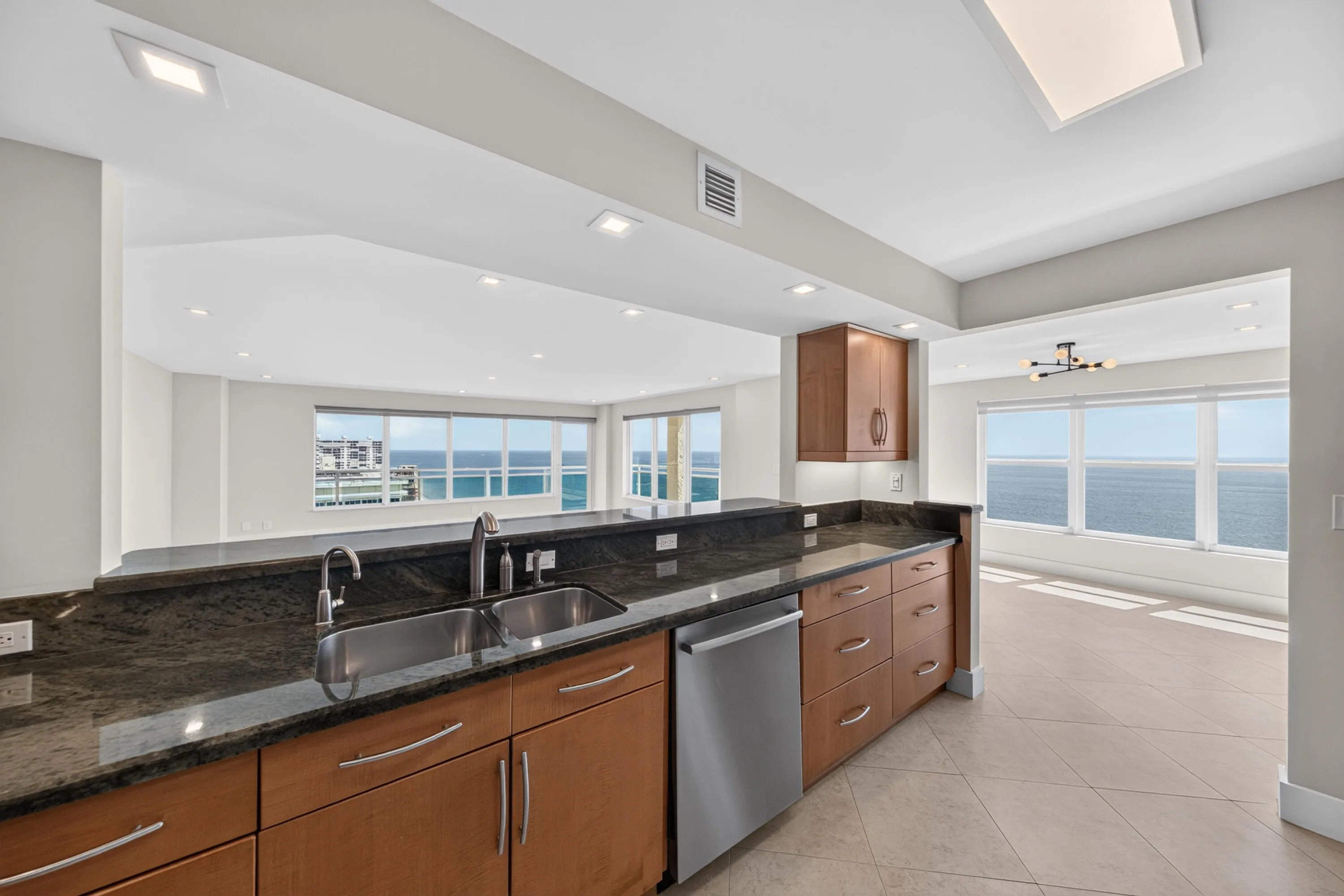 Prepare and entertain while enjoying panoramic ocean views from the open kitchen and adjoining living areas.