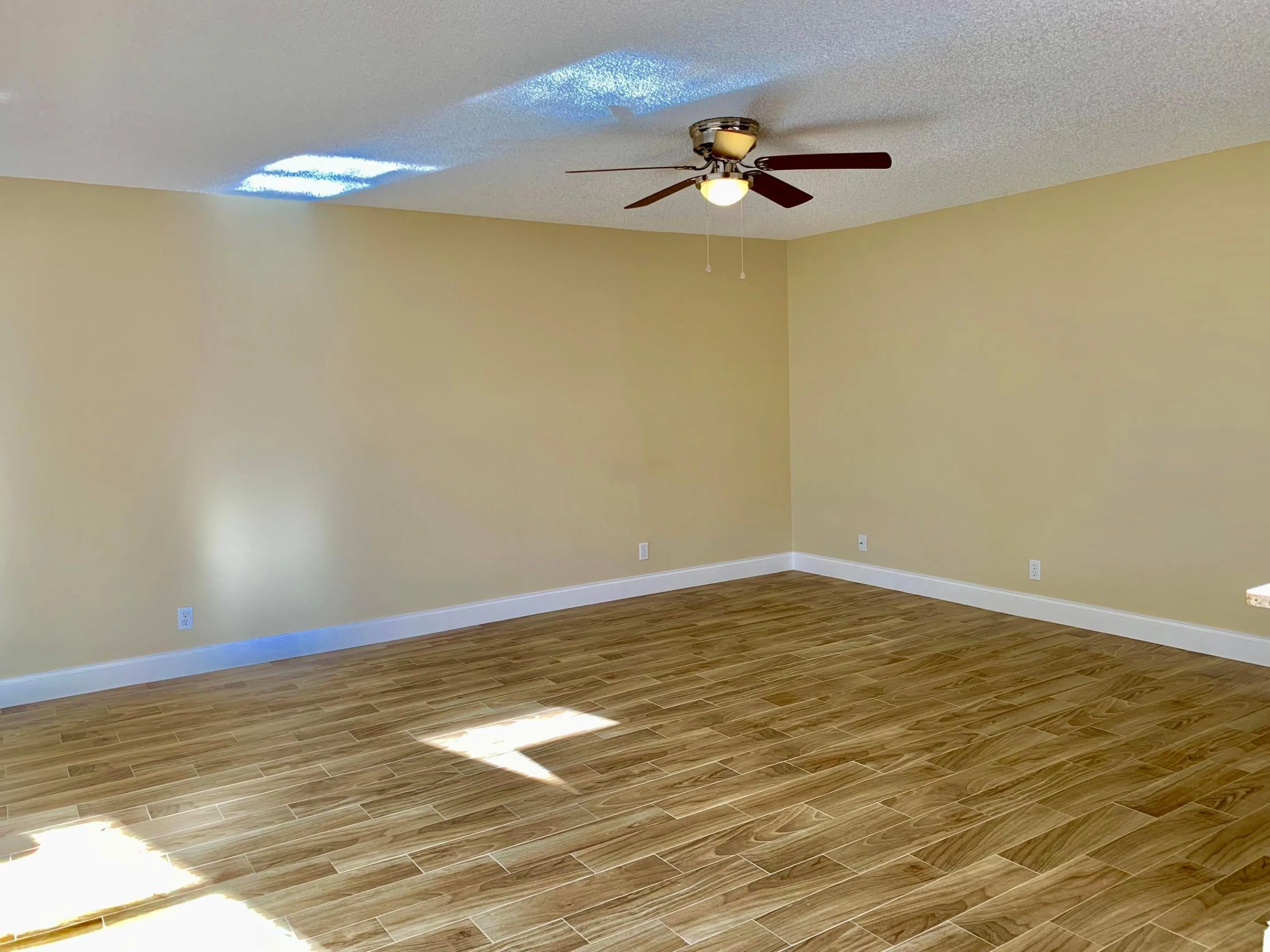 Porcelain Wood Plank Tile Floors Thru out.