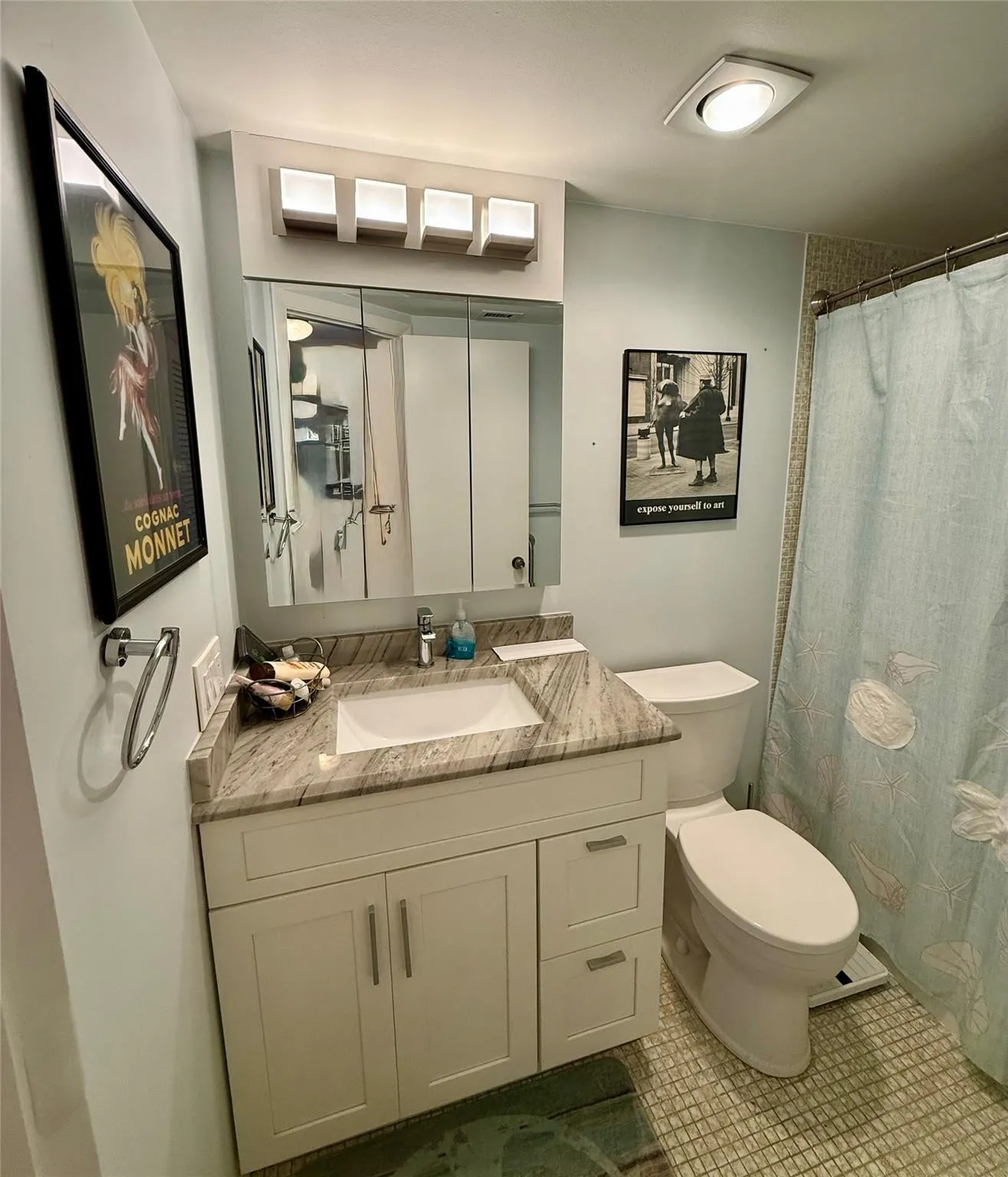 Bedroom 2 bath, pocket door in hallway allows for bedroom 2 to be its own private en suite
