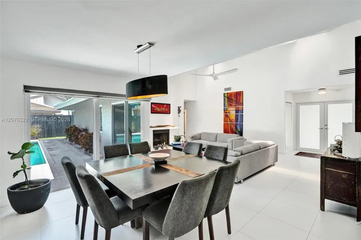 Dining area - pool view. Hurricane Impact Windows