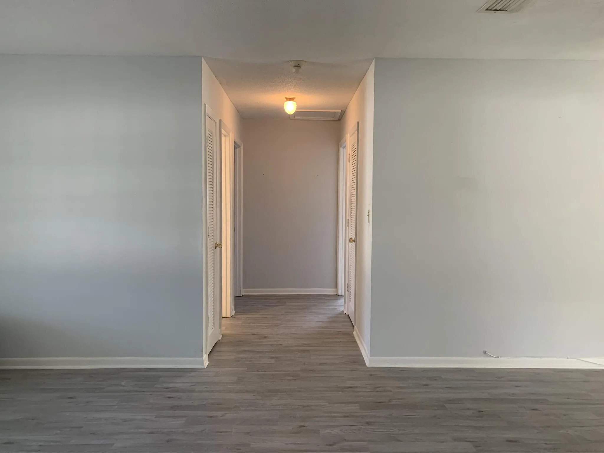 Wood-finish flooring throughout