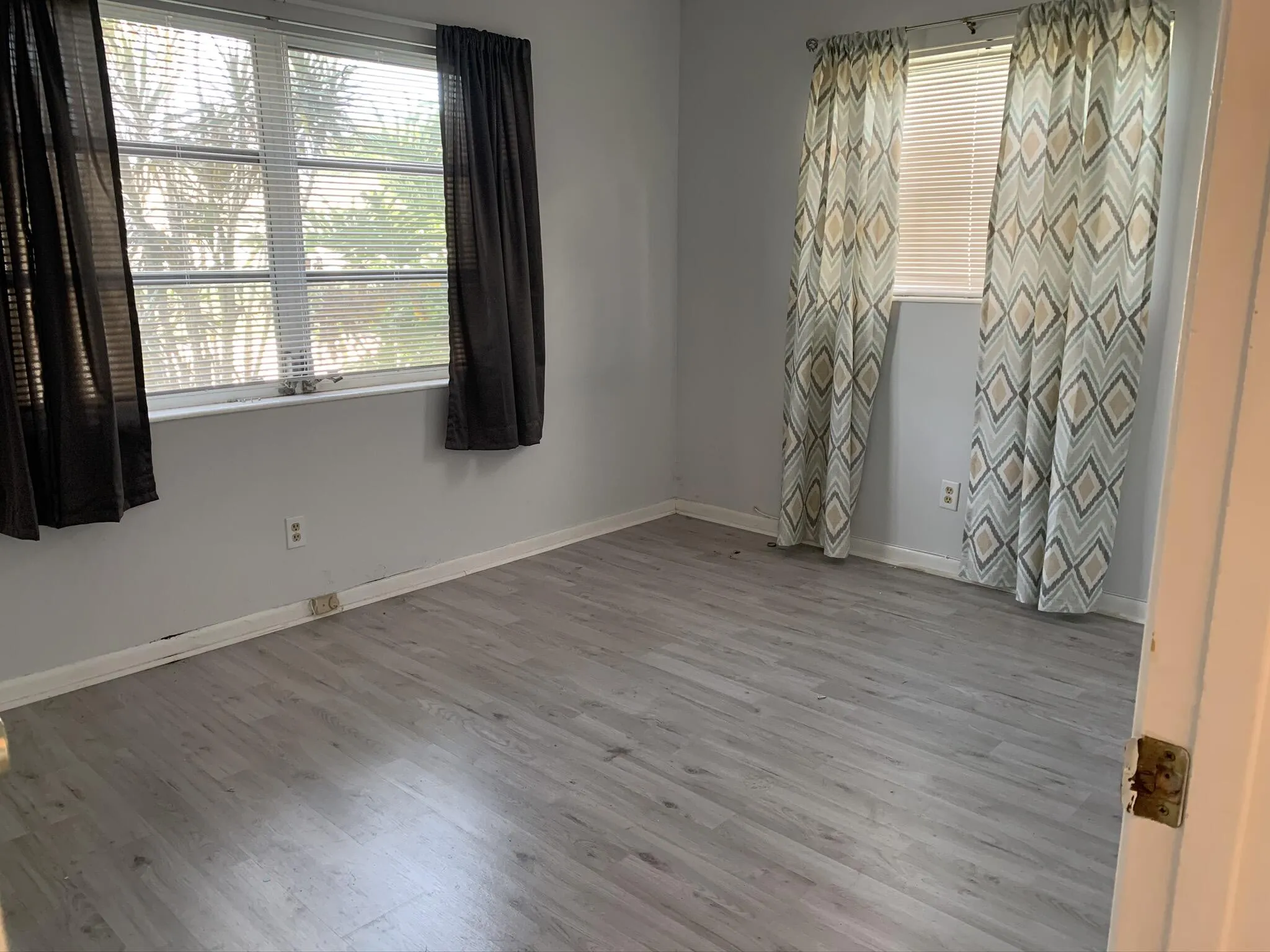 Wood-finish flooring with light-toned walls