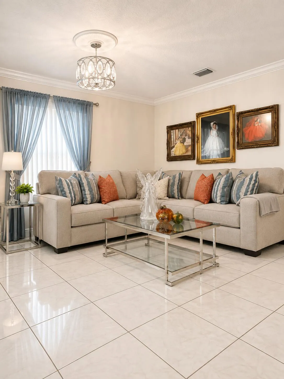 Recessed lighting, crown molding, a decorative ceiling medallion, and a chandelier with a crystal-like enclosure