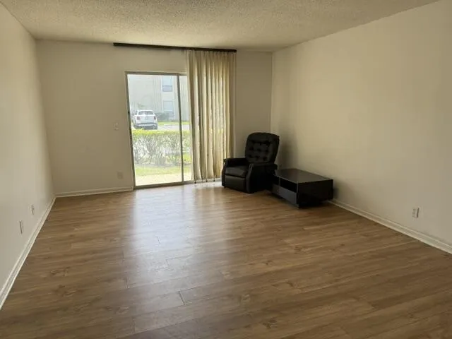 Living Room area with sliding door to patio