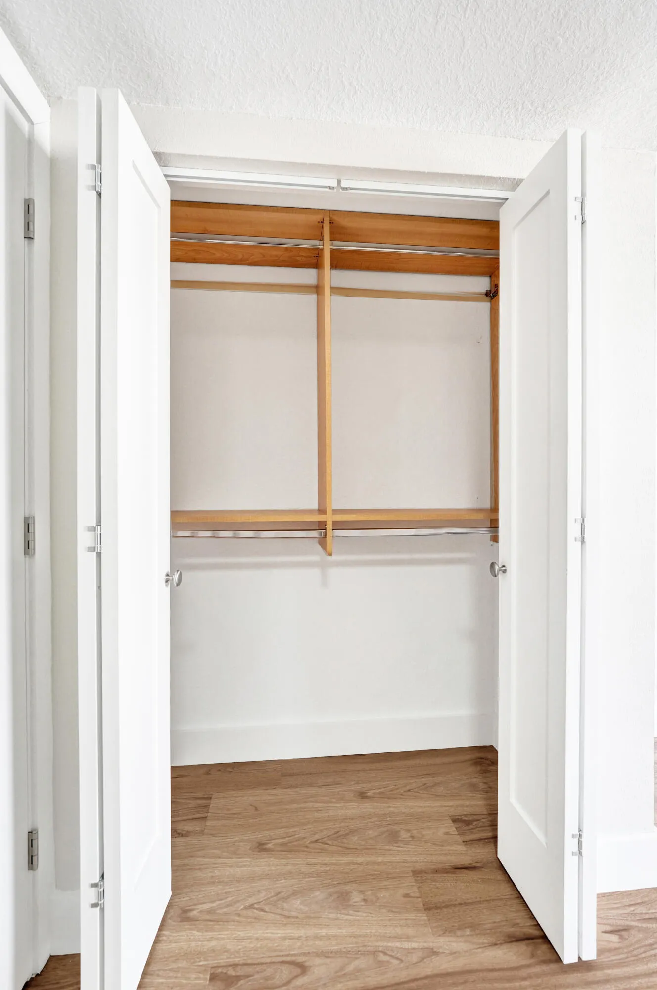 Primary bedroom - second custom closet is double hung