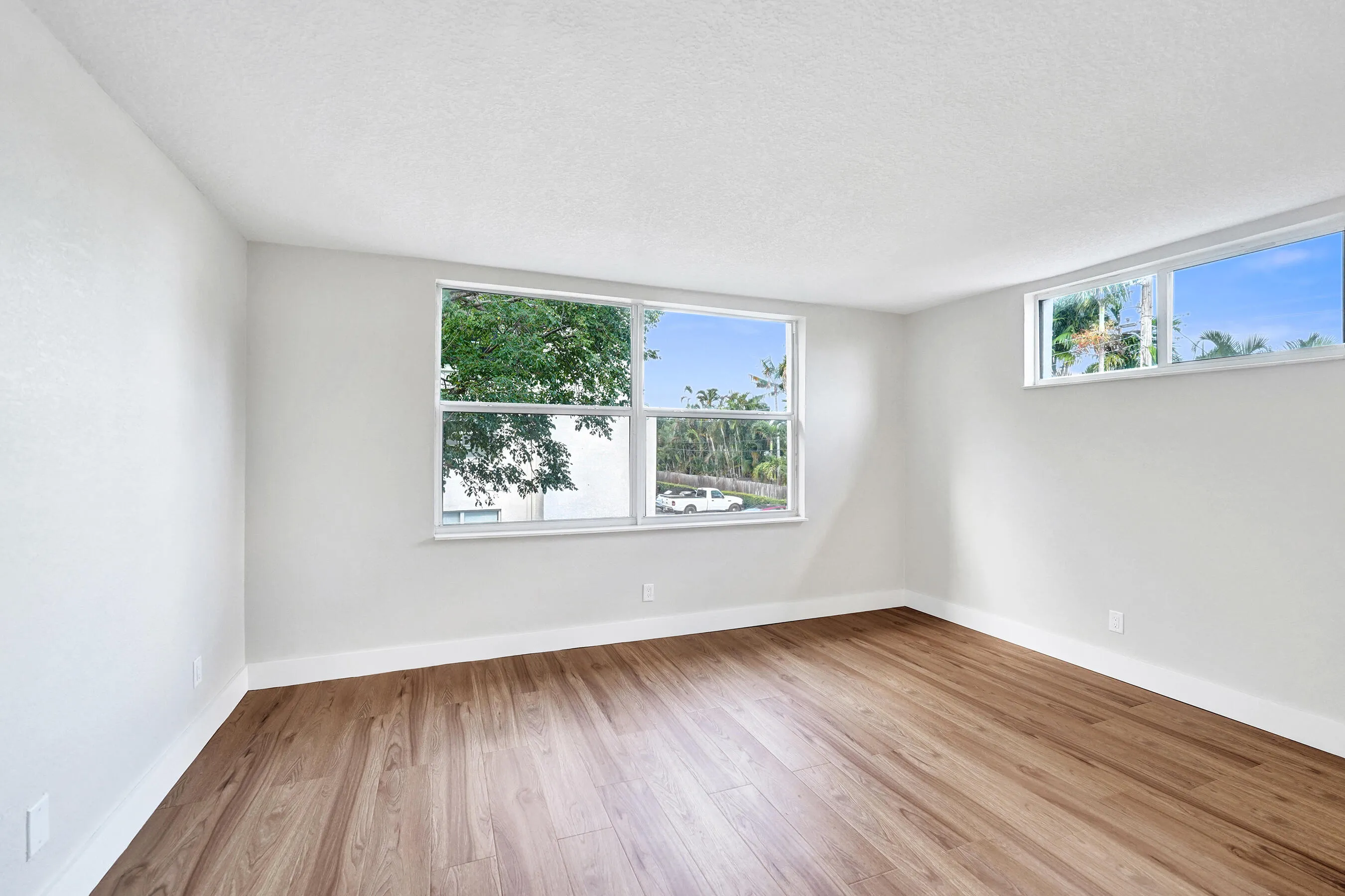 Primary bedroom - Corner units are bright and airy