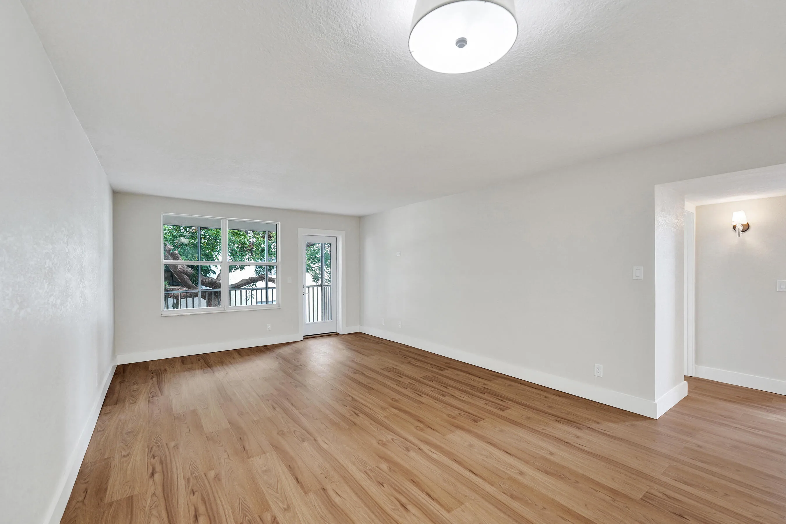Living area offers views of courtyard