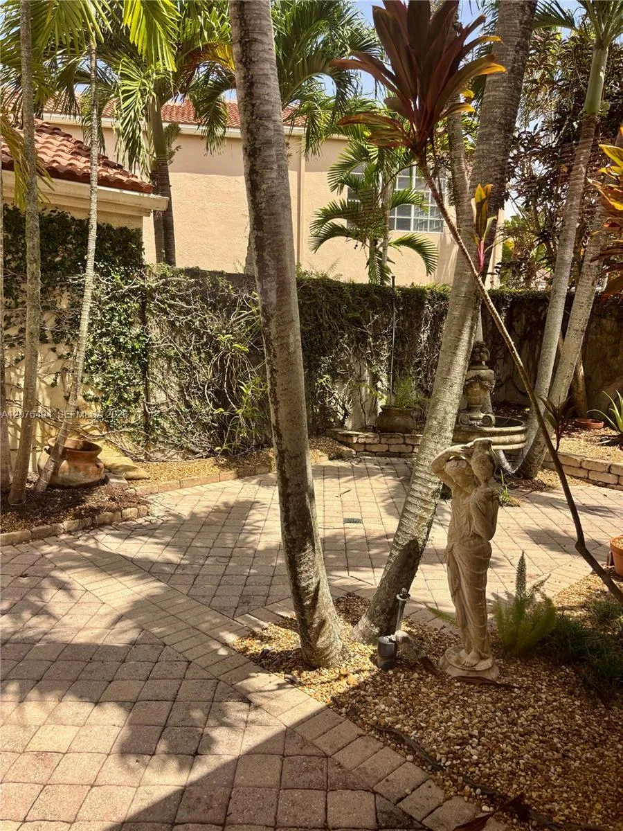 Private walled patio and garden view from Primary Suite