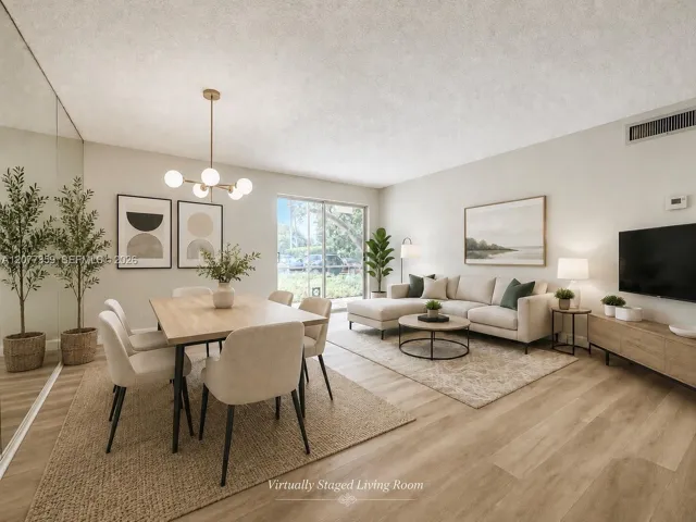 Virtually staged living and dining area