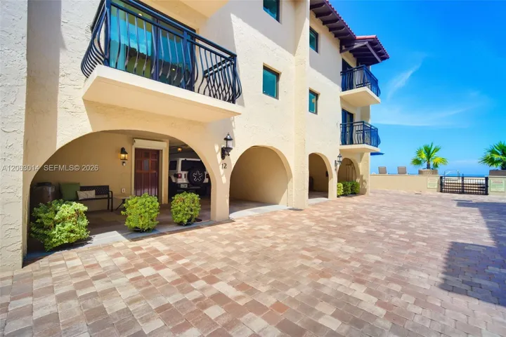Front of Home w/ Covered Parking