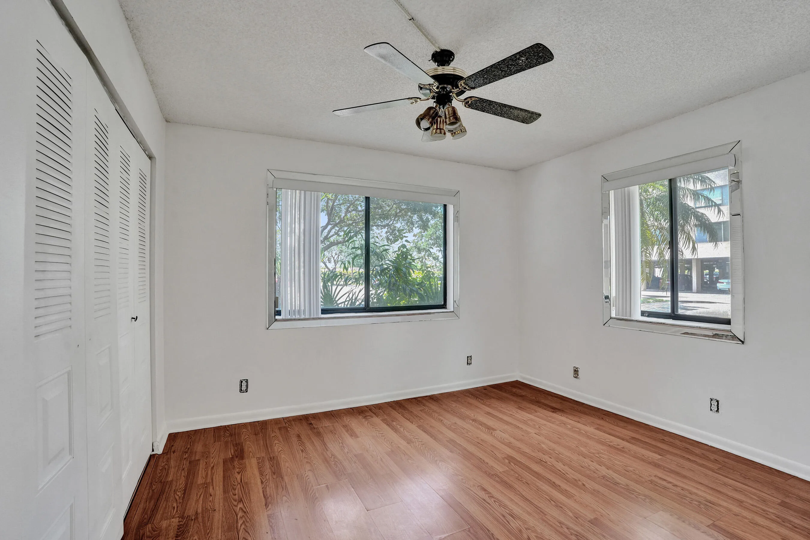 Wood-finish flooring with white walls