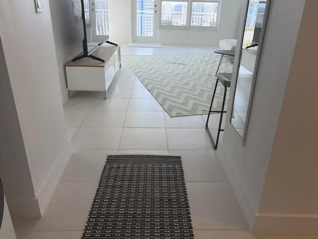 White tiled flooring throughout