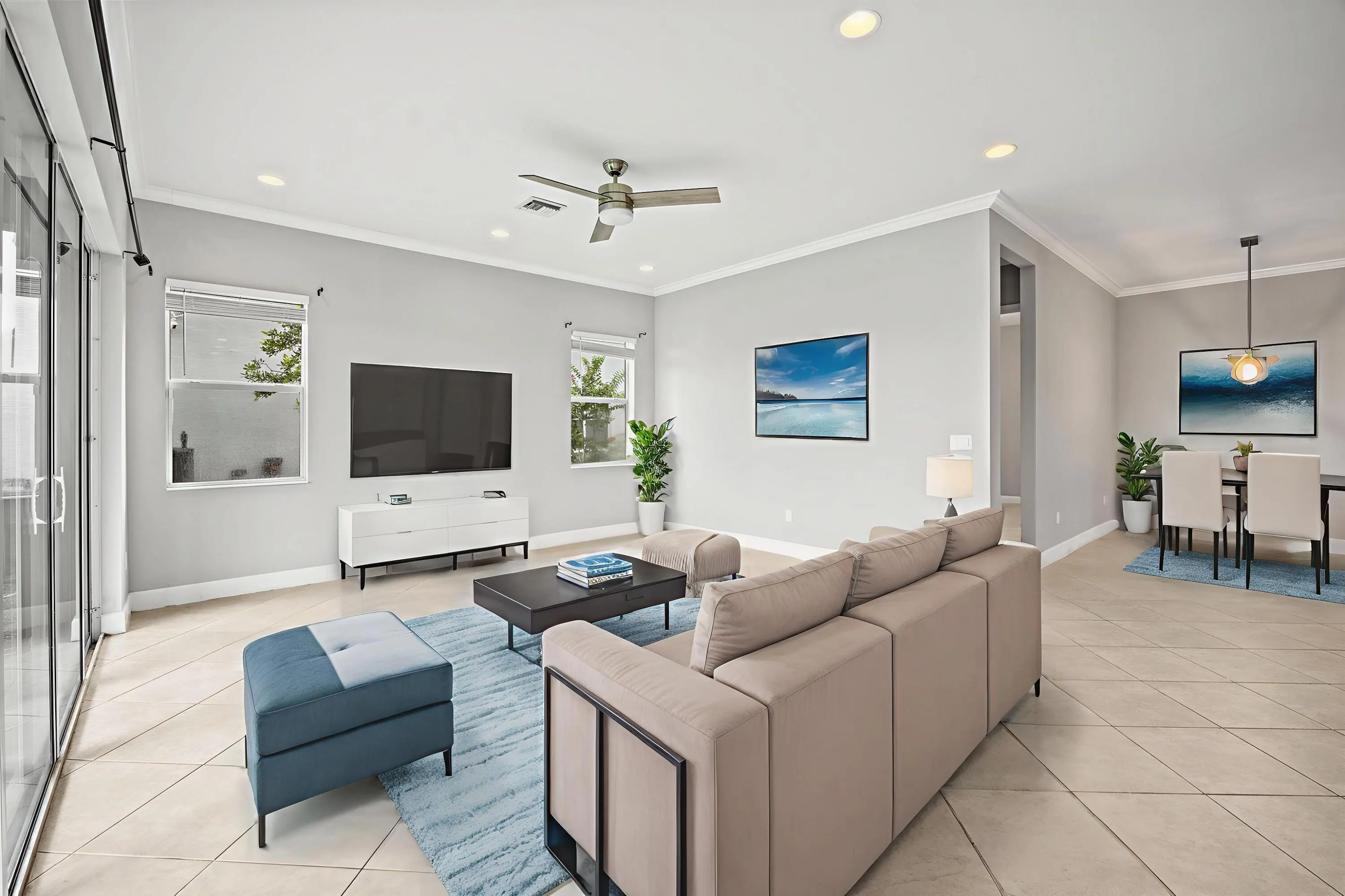 Recessed lighting, crown molding, and tiled flooring
