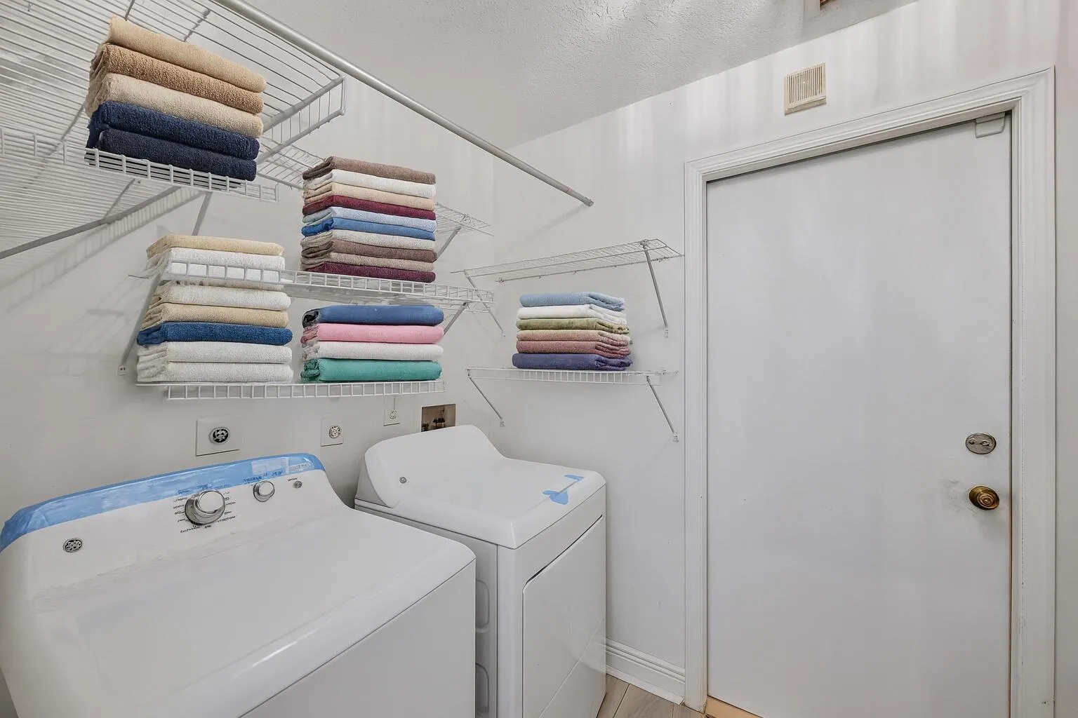 Organized Laundry Room with Appliances