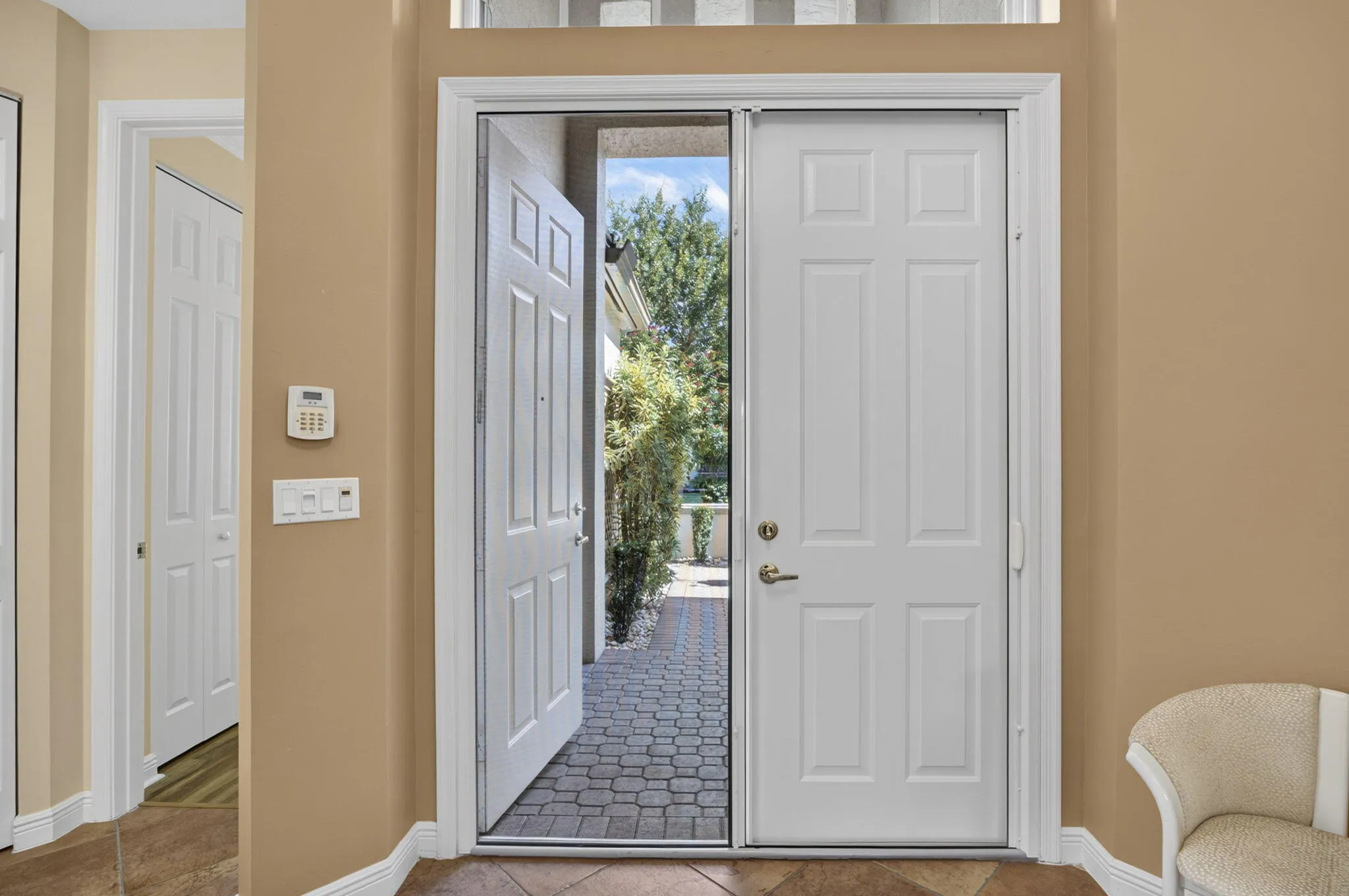 Take a look - retractable screen doors were installed for extra breezeway in season