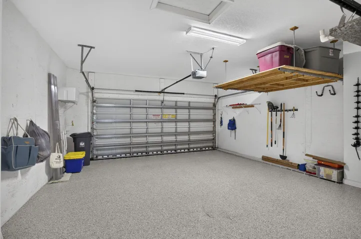 Upgrades - Epoxy Floors and special outlet added for EV Charging