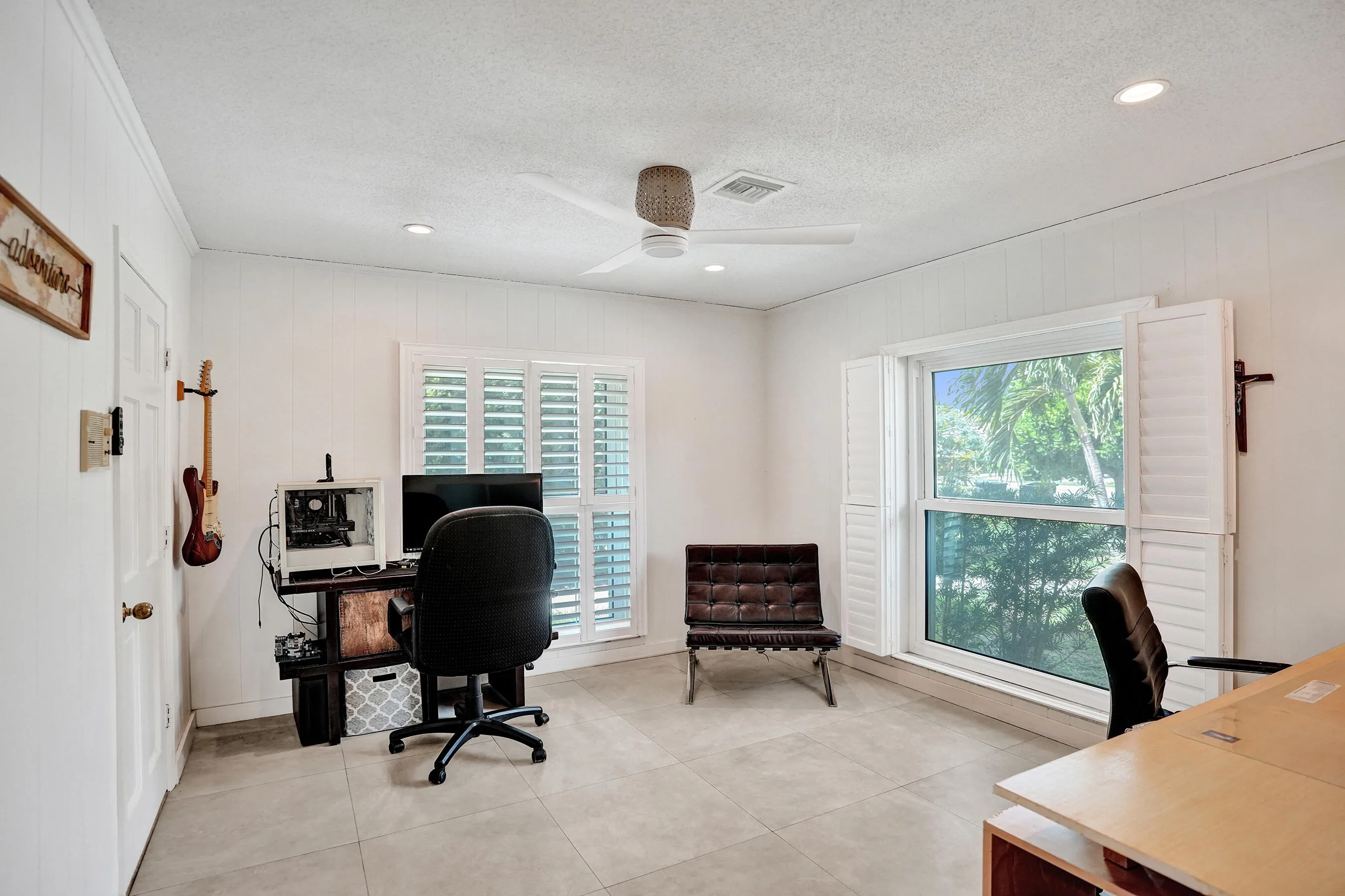 5th Bedroom adjoins the master bath and has private entrance off Living room.