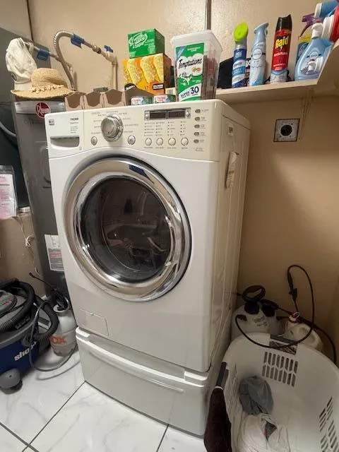 Laundry room off hallway to garage