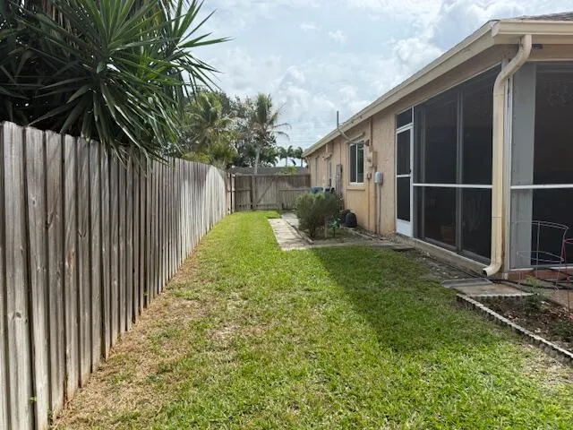 side fenced in yard