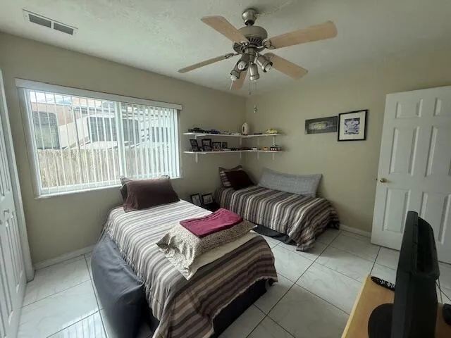 large windows in 2nd bedroom