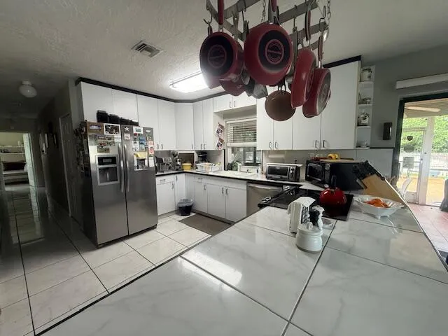 extra cabinet and work space in kitchen