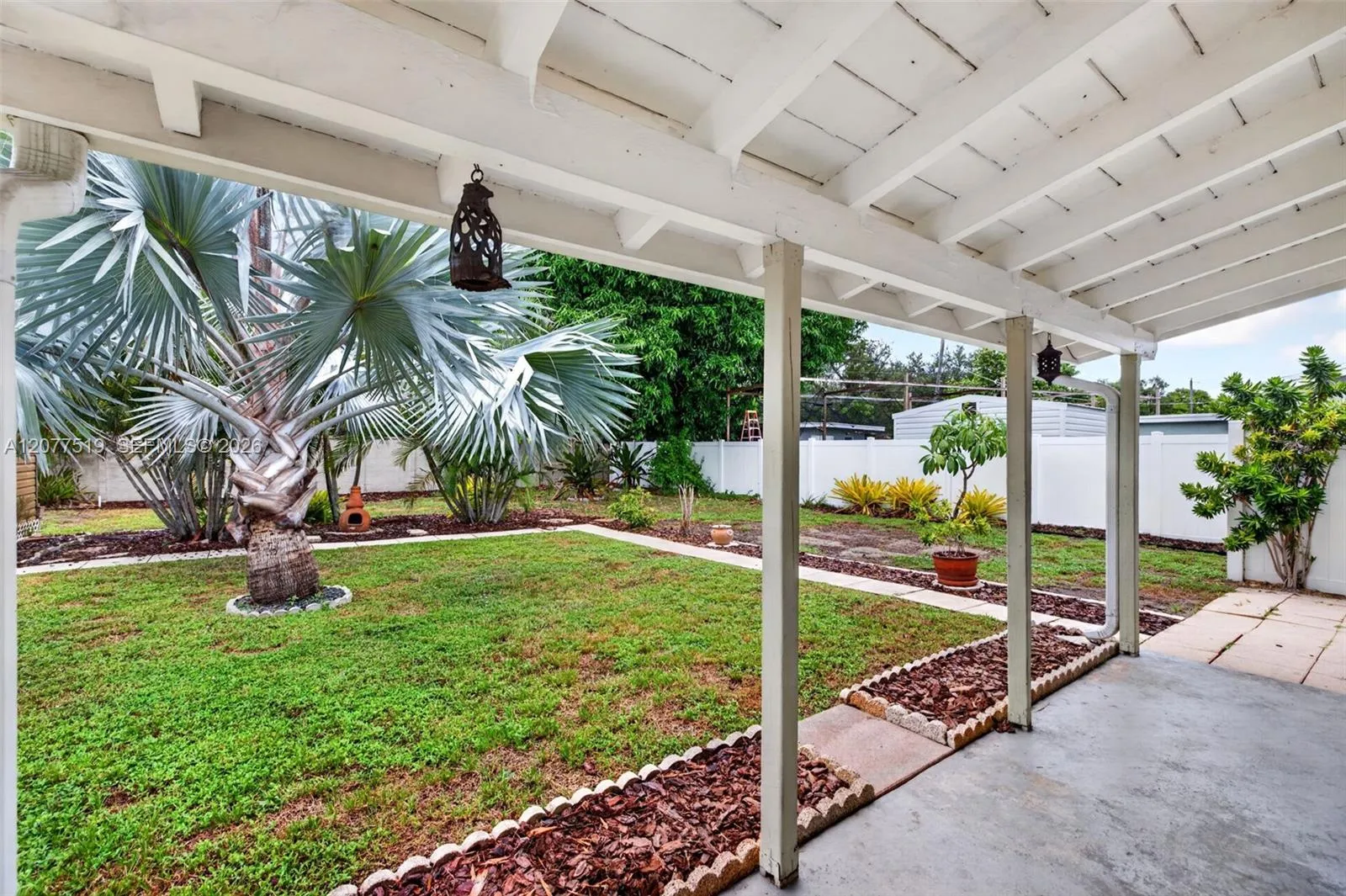 VC fencing surrounds portions of the property for added privacy and security.