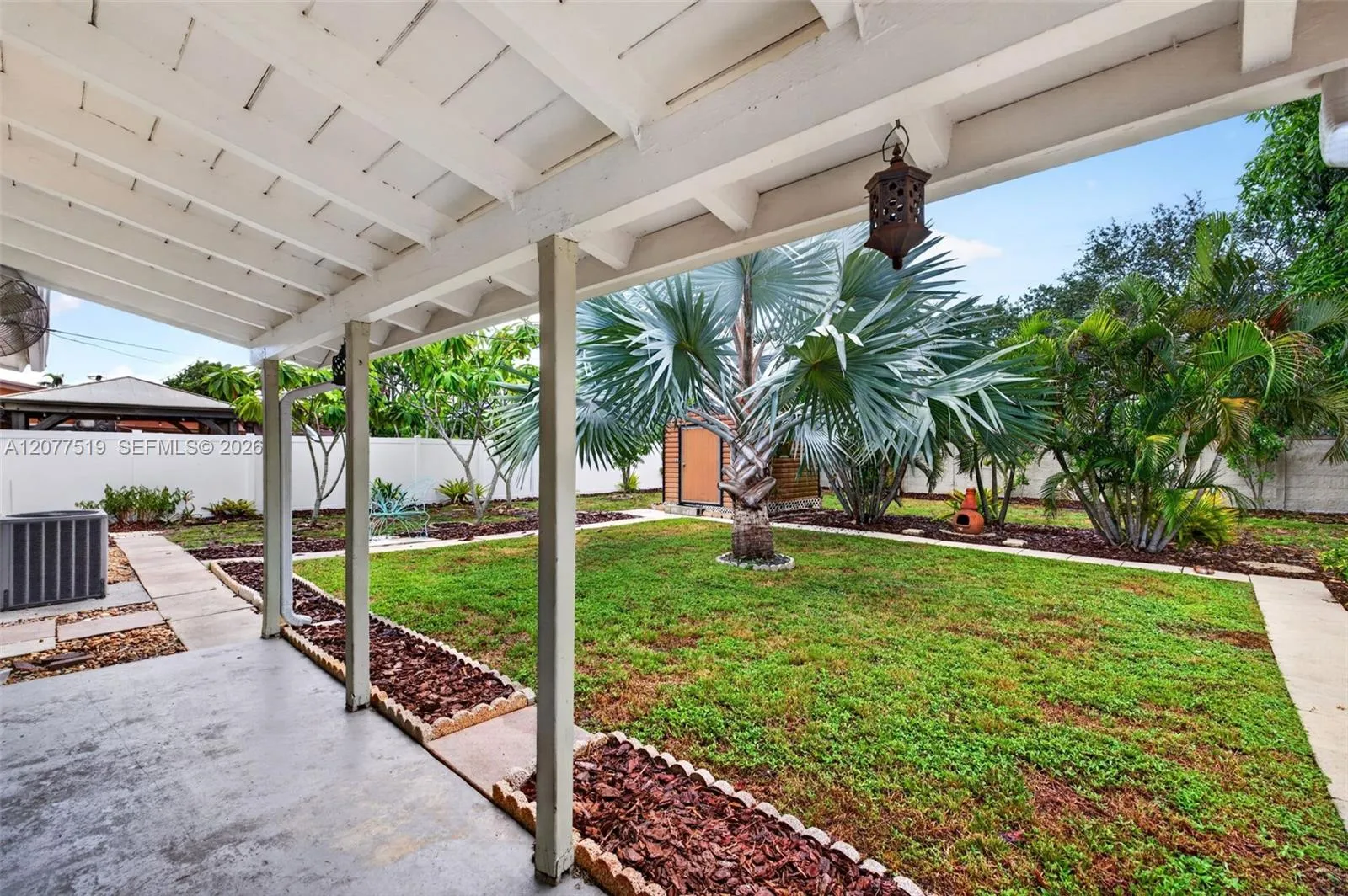 VC fencing surrounds portions of the property for added privacy and security.