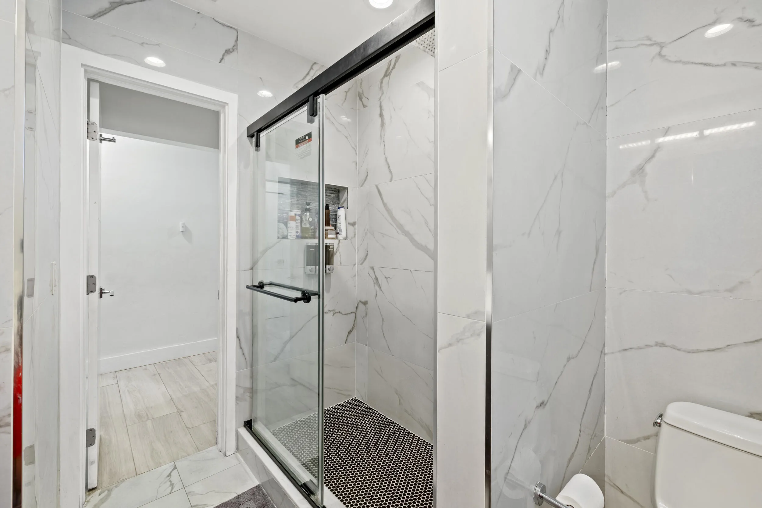 stand up shower tile throughout