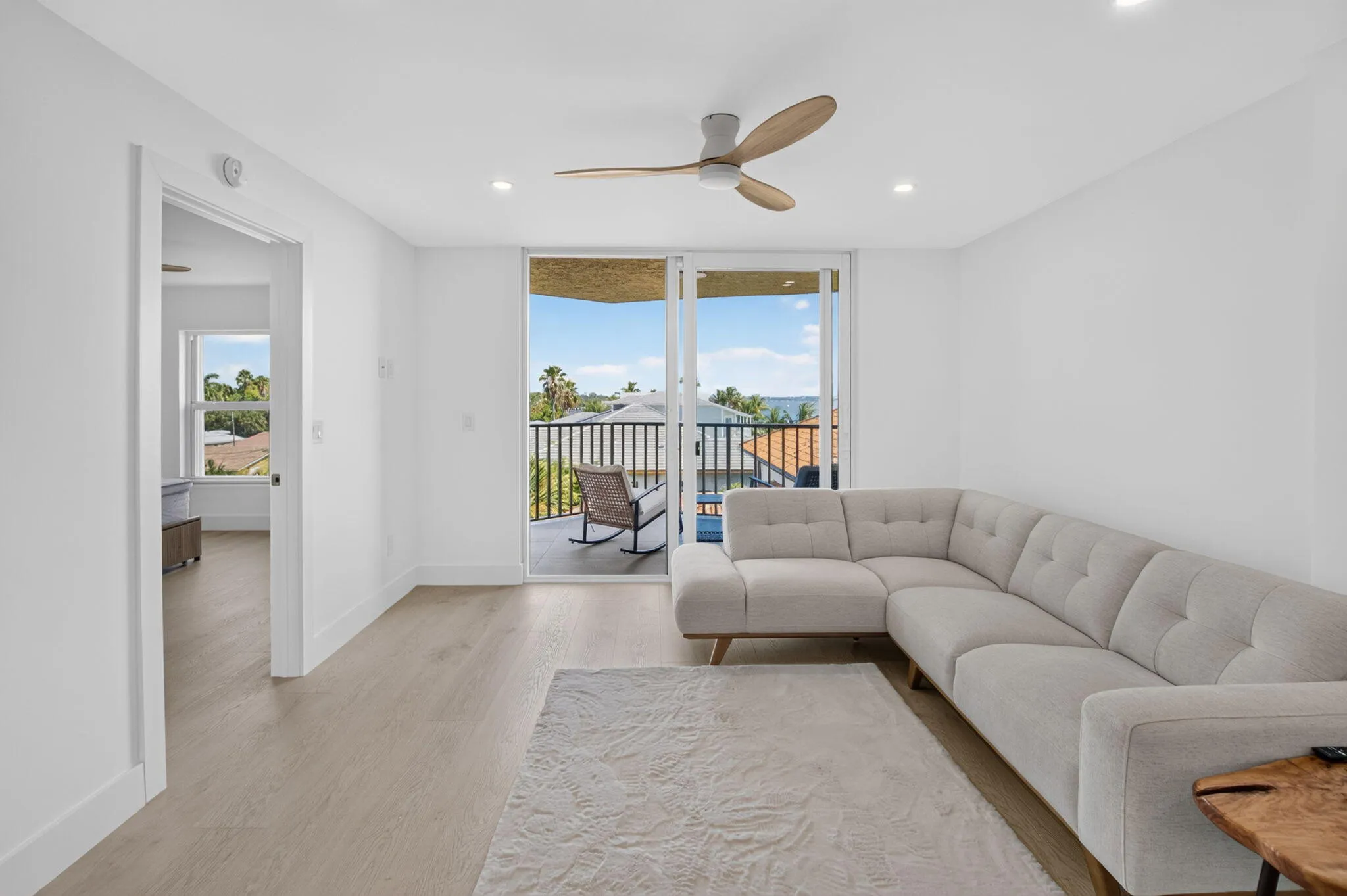 Great room living opens to large balcony
