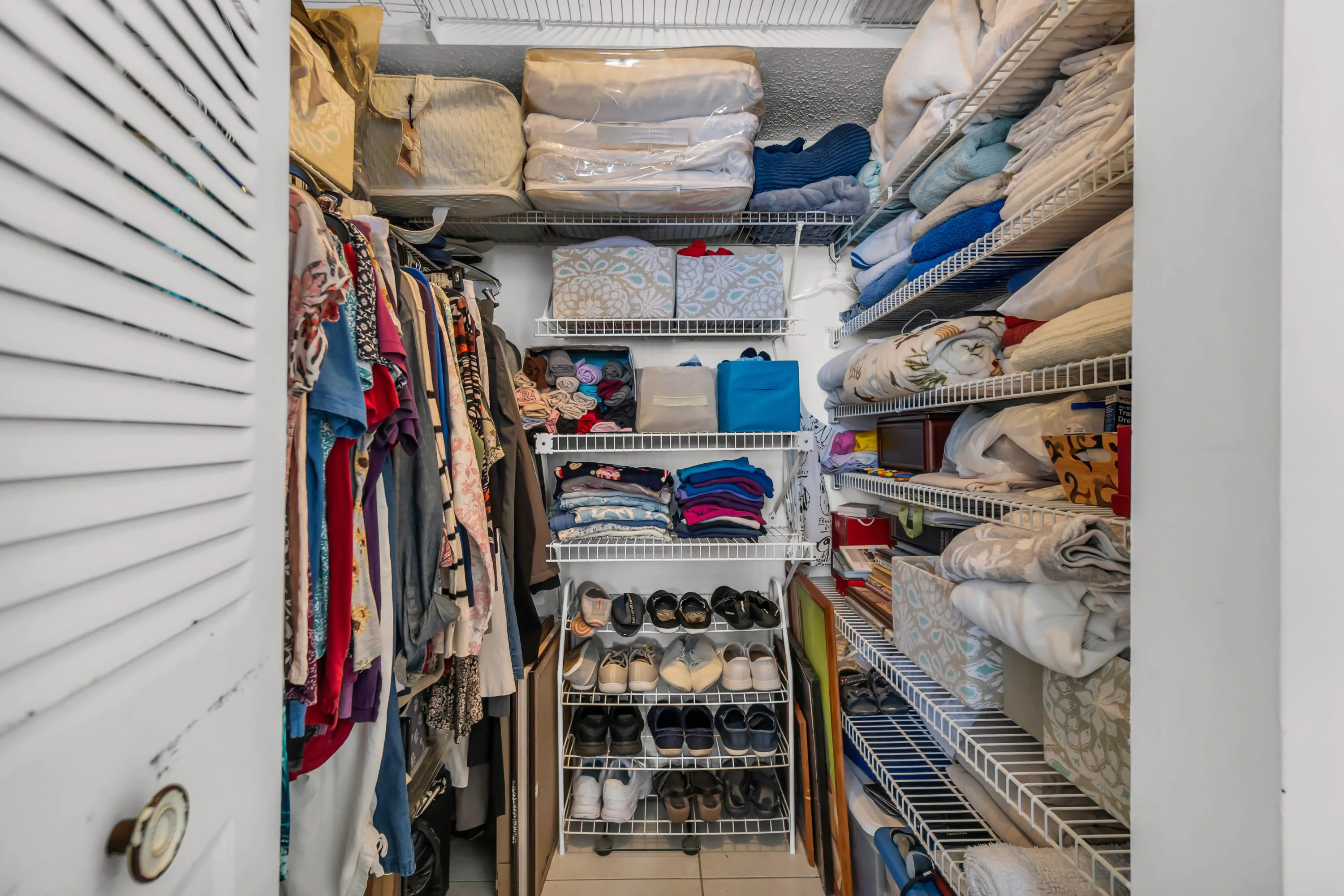 MAIN BEDROOM WALK IN CLOSET