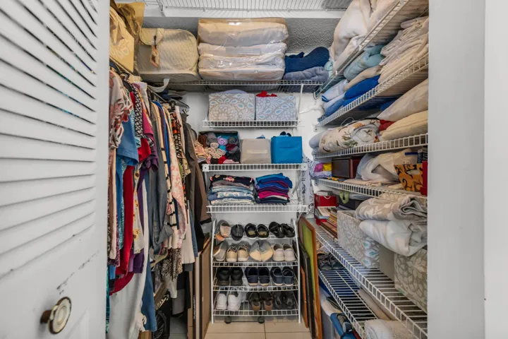 MAIN BEDROOM WALK IN CLOSET