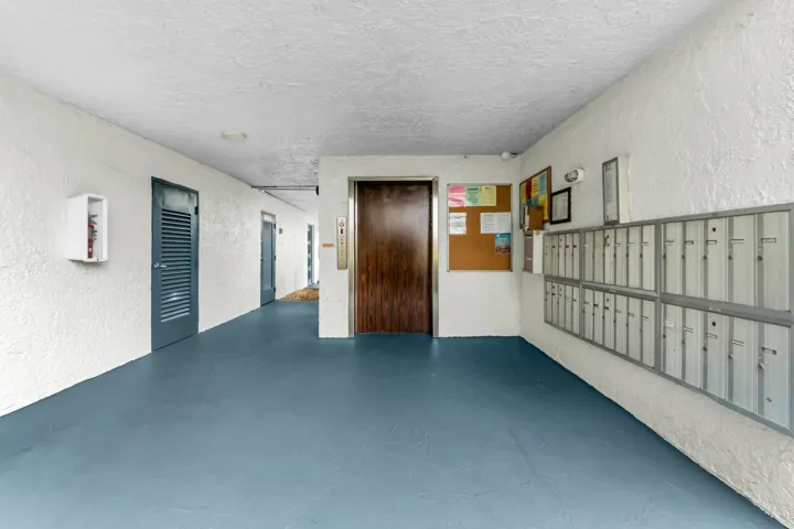 ELEVATOR, MAIL BOXES ON FIRST FLOOR