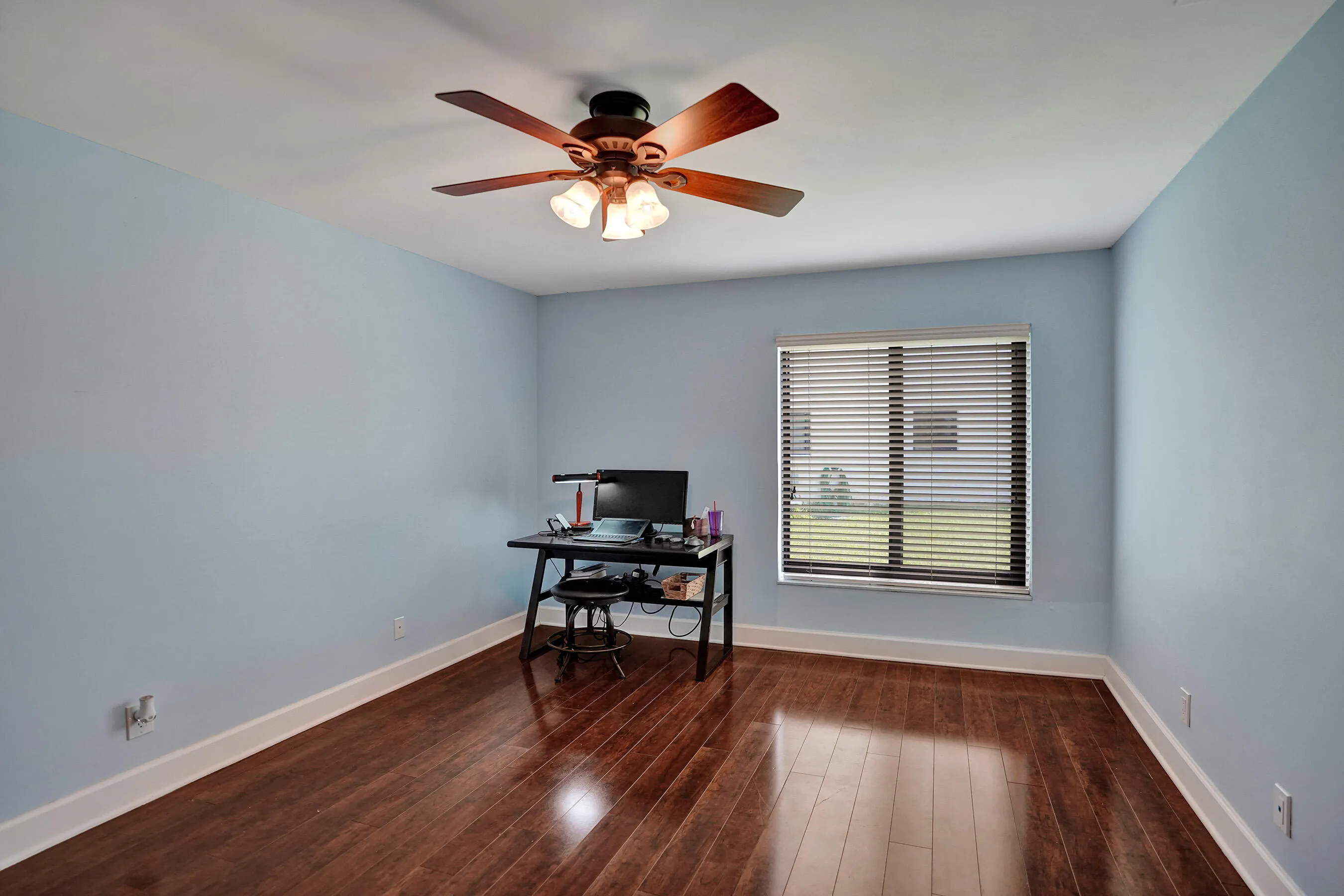 Hardwood-style flooring throughout