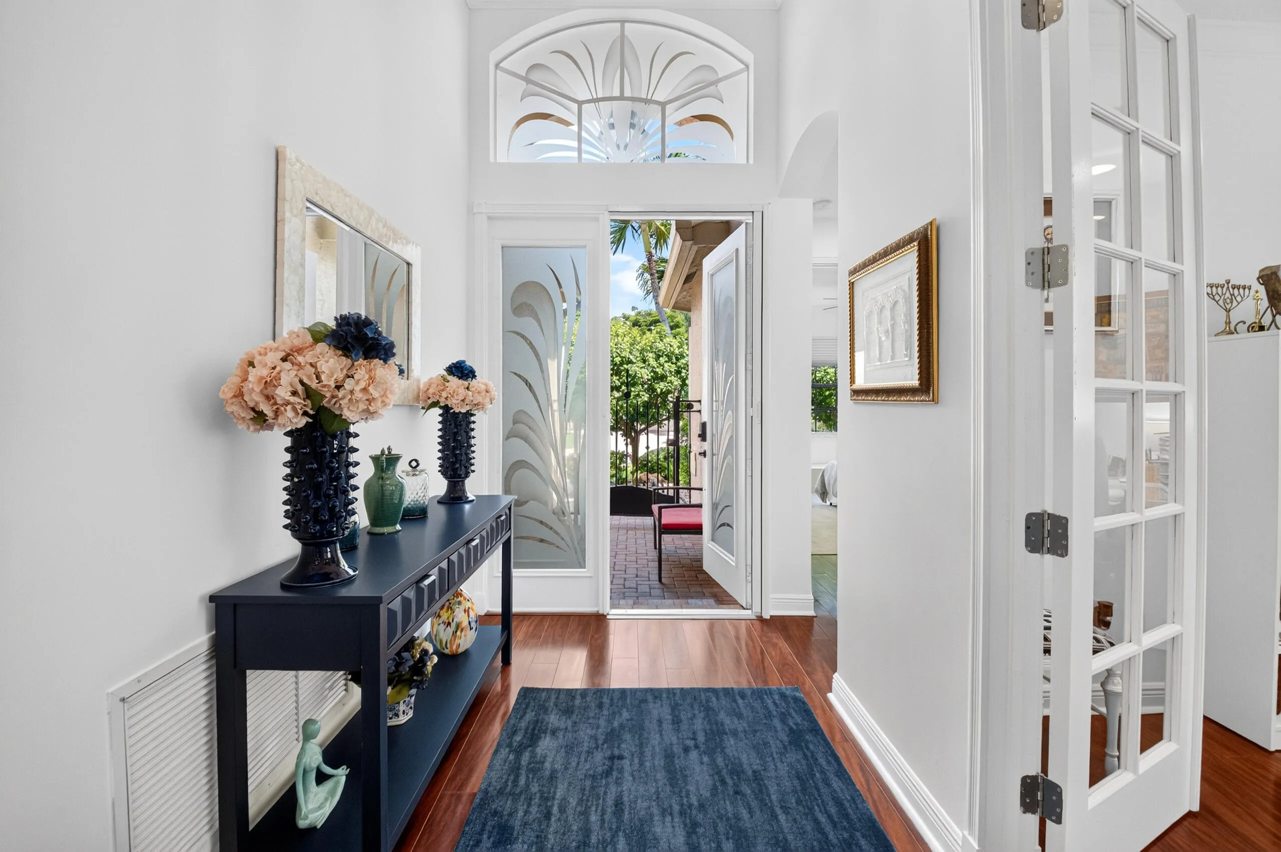 Matching transom windows creates a beautiful first impression