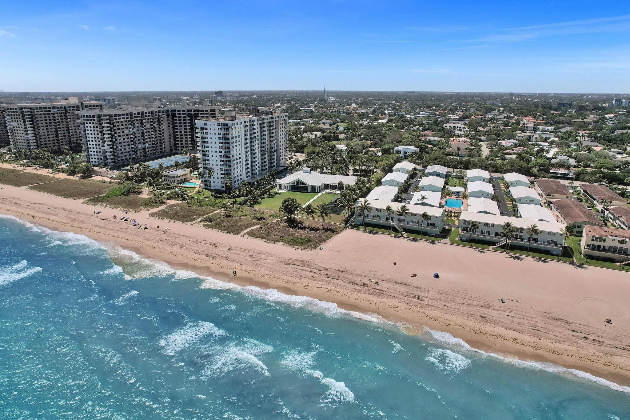 Residents enjoy a Private Beach Club