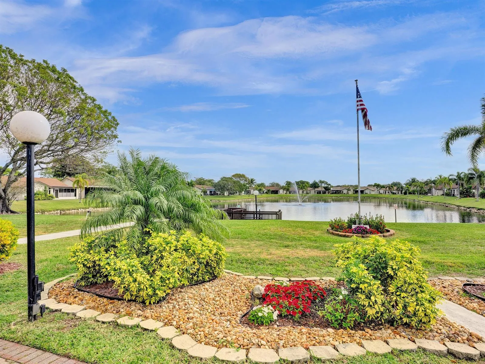 Walkinf from the back of the clubhouse to the beautiful dock and lake view!