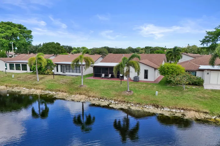 Aerial view of the back of the house and the lake