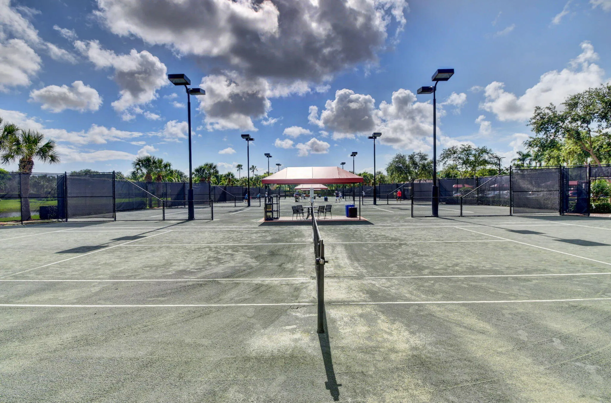 6 LIGHTED HAR-TRU TENNINS COURTS
