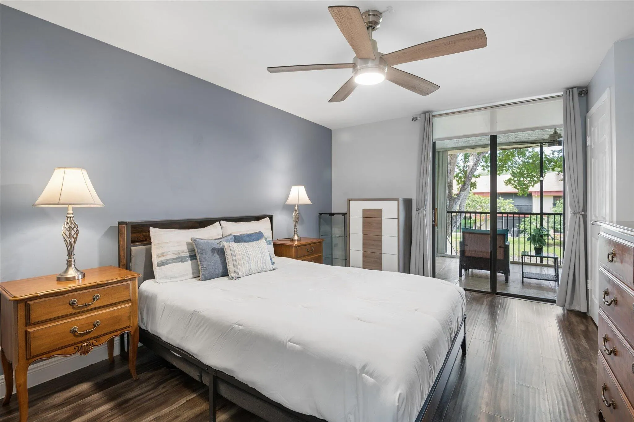 Primary bedroom suite with patio access