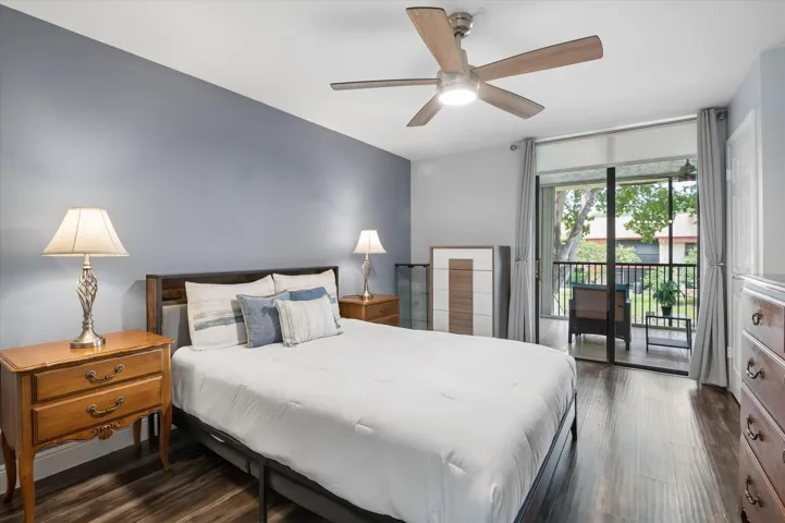 Primary bedroom suite with patio access