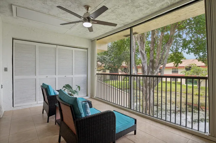 Outdoor screened patio with lake views