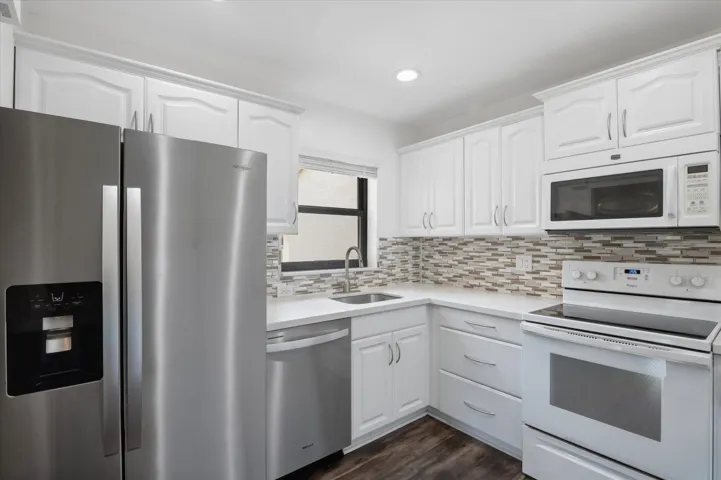 Remodeled kitchen with stainless appliances