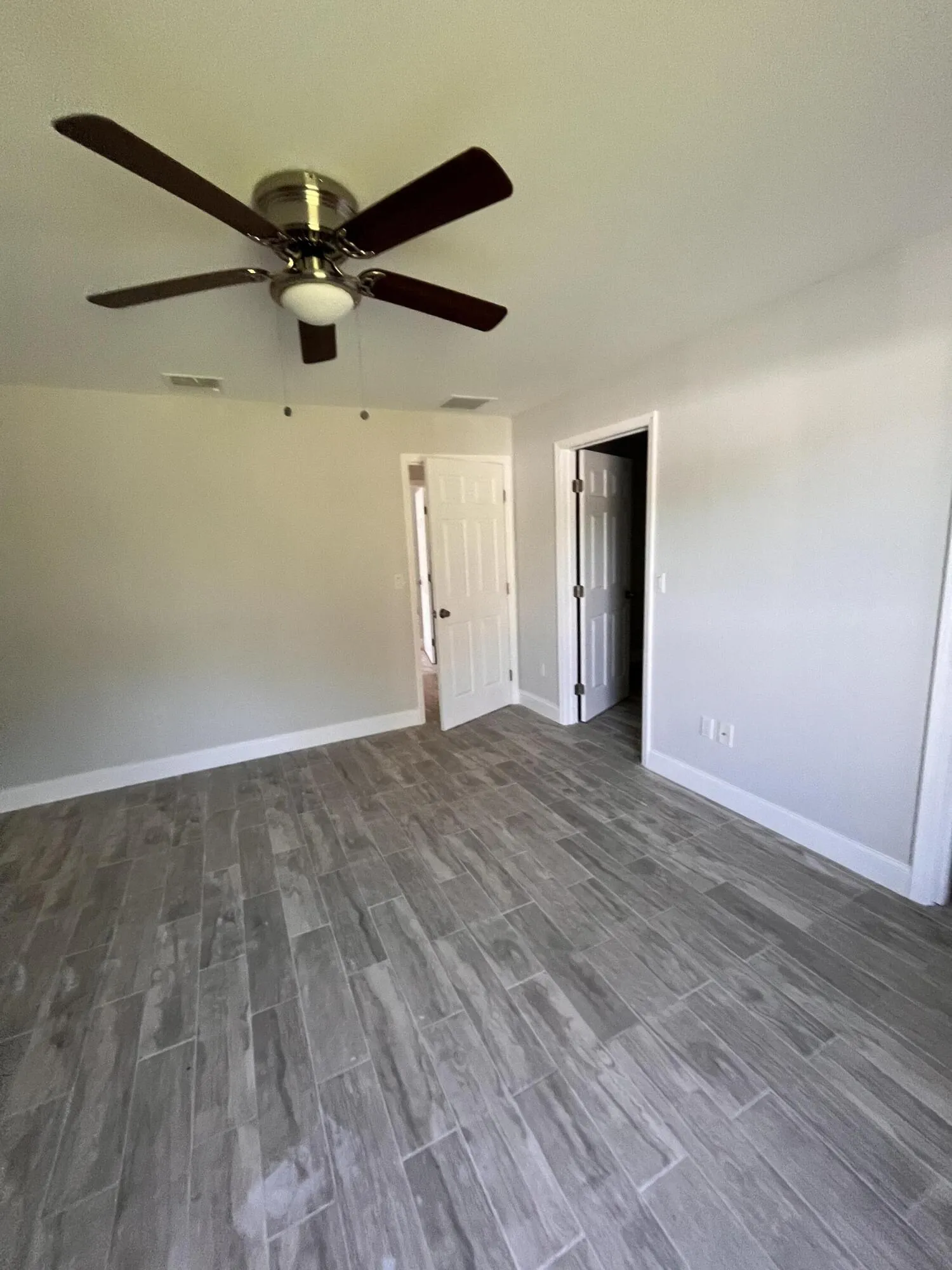 Wood-look tile flooring throughout