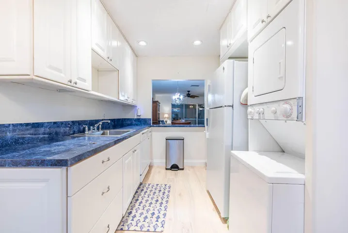 Kitchen with Stacked Washer and Dryer
