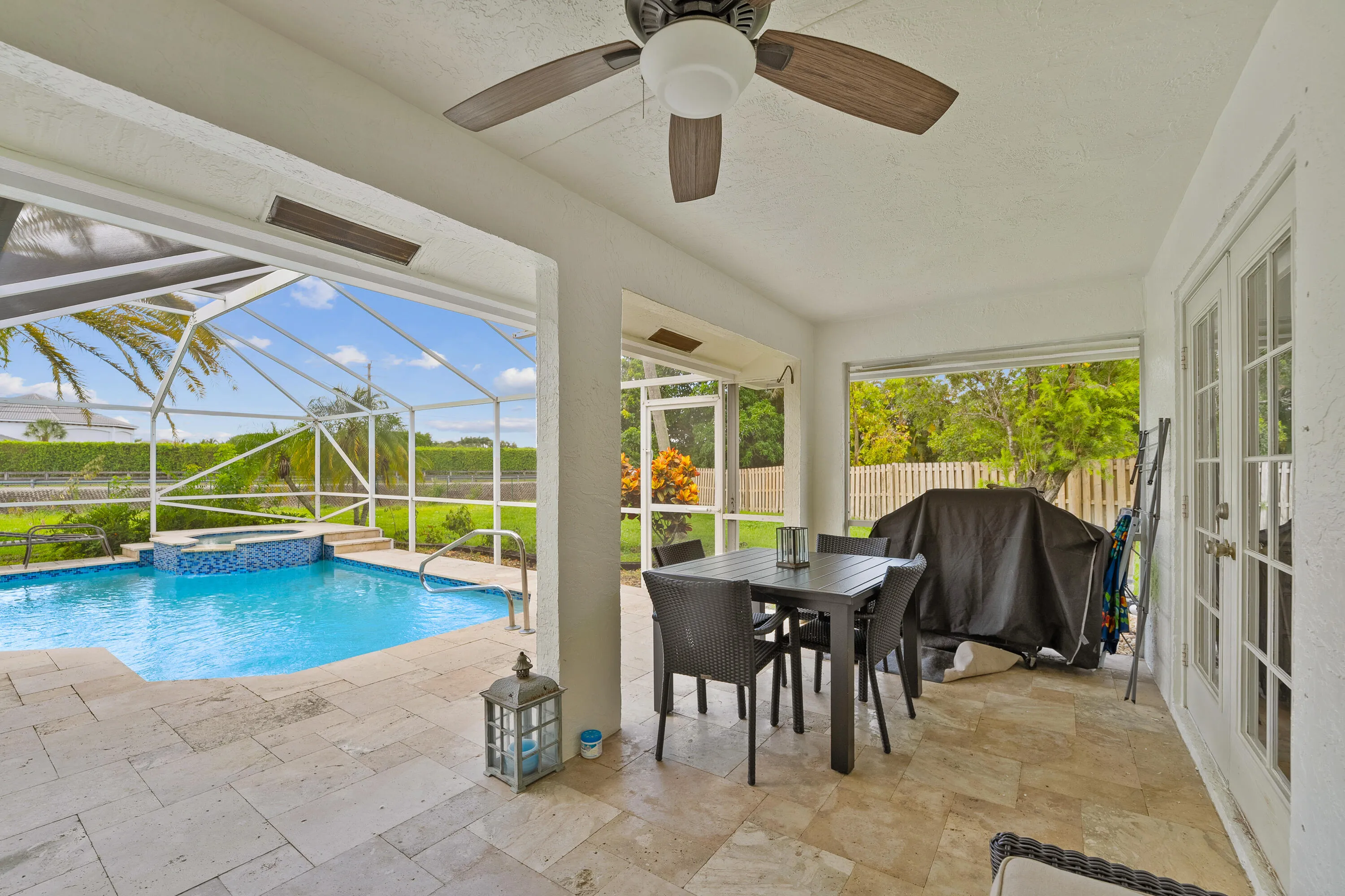 Screened lanai with pool and grill