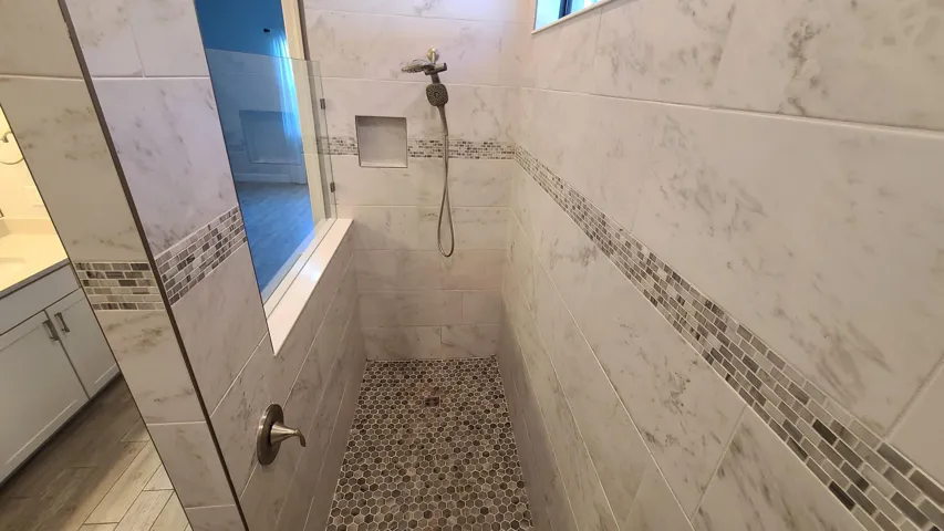 Owner's en-suite walk-in shower