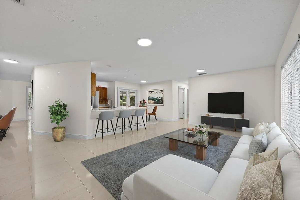 Where everyday moments start to feel like home. The open-concept living space flows effortlessly into the kitchen and dining areas, creating an inviting setting for quiet mornings, relaxed evenings, and everything in between.