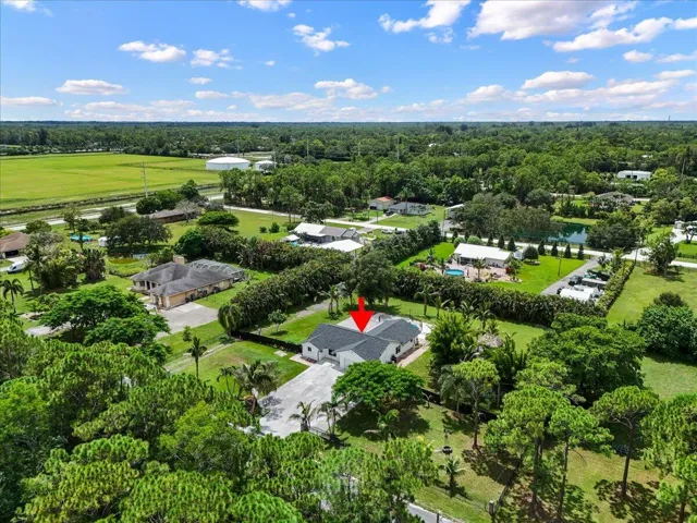 Your own piece of Loxahatchee, surrounded by the space and privacy that make this area so special. Red outline and arrow indicate the approximate property location and boundaries for illustrative purposes only.