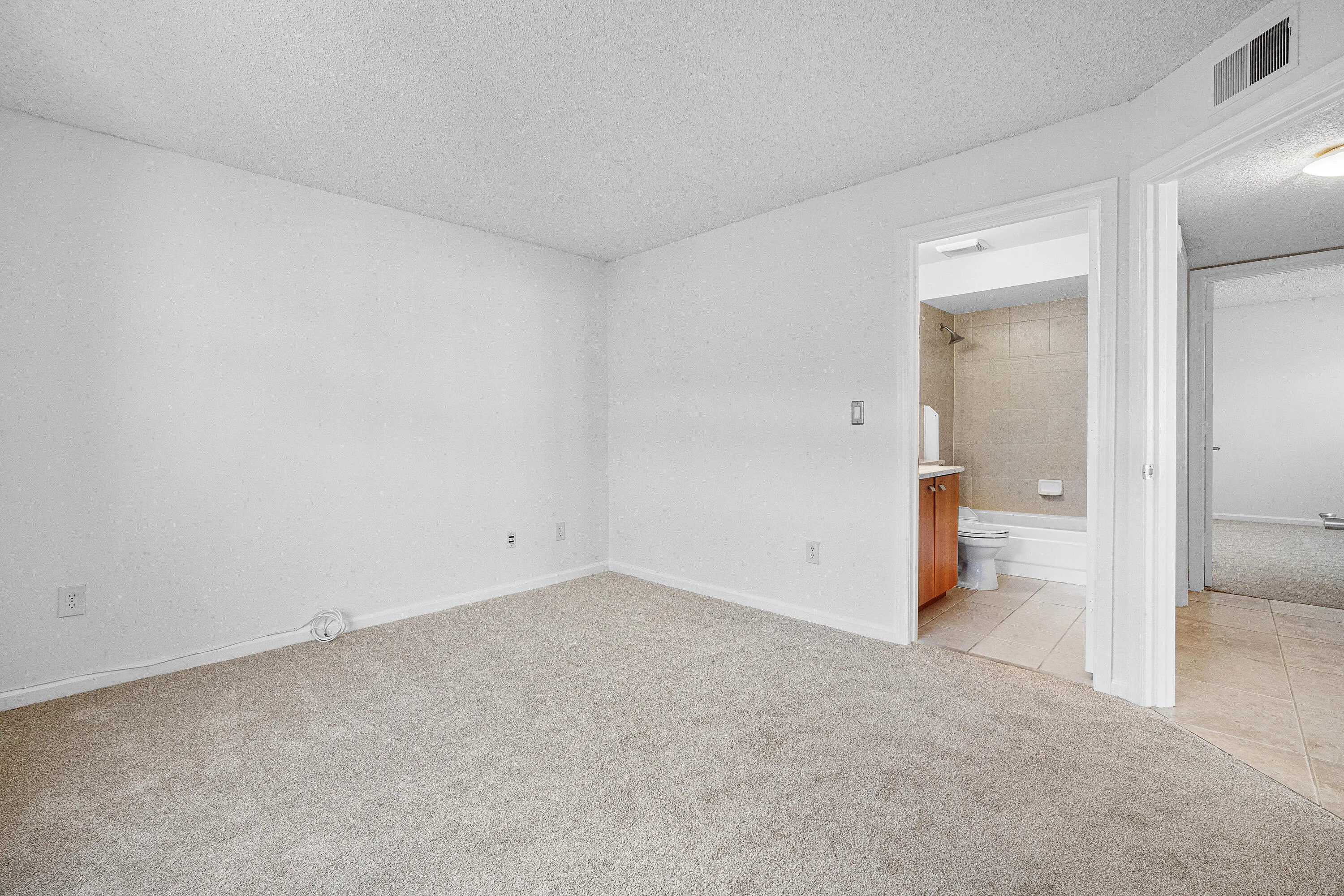2nd Bathroom is accessible via hallway and en-suite 2nd Bedroom